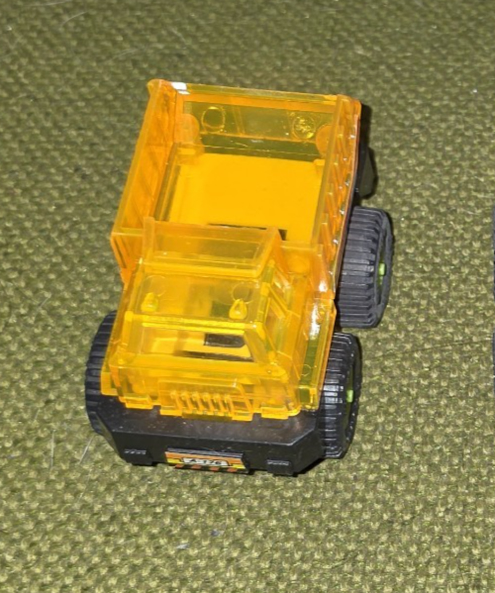 MegaTop Machine Sparking Friction Crystalline Color Orange Dump Truck